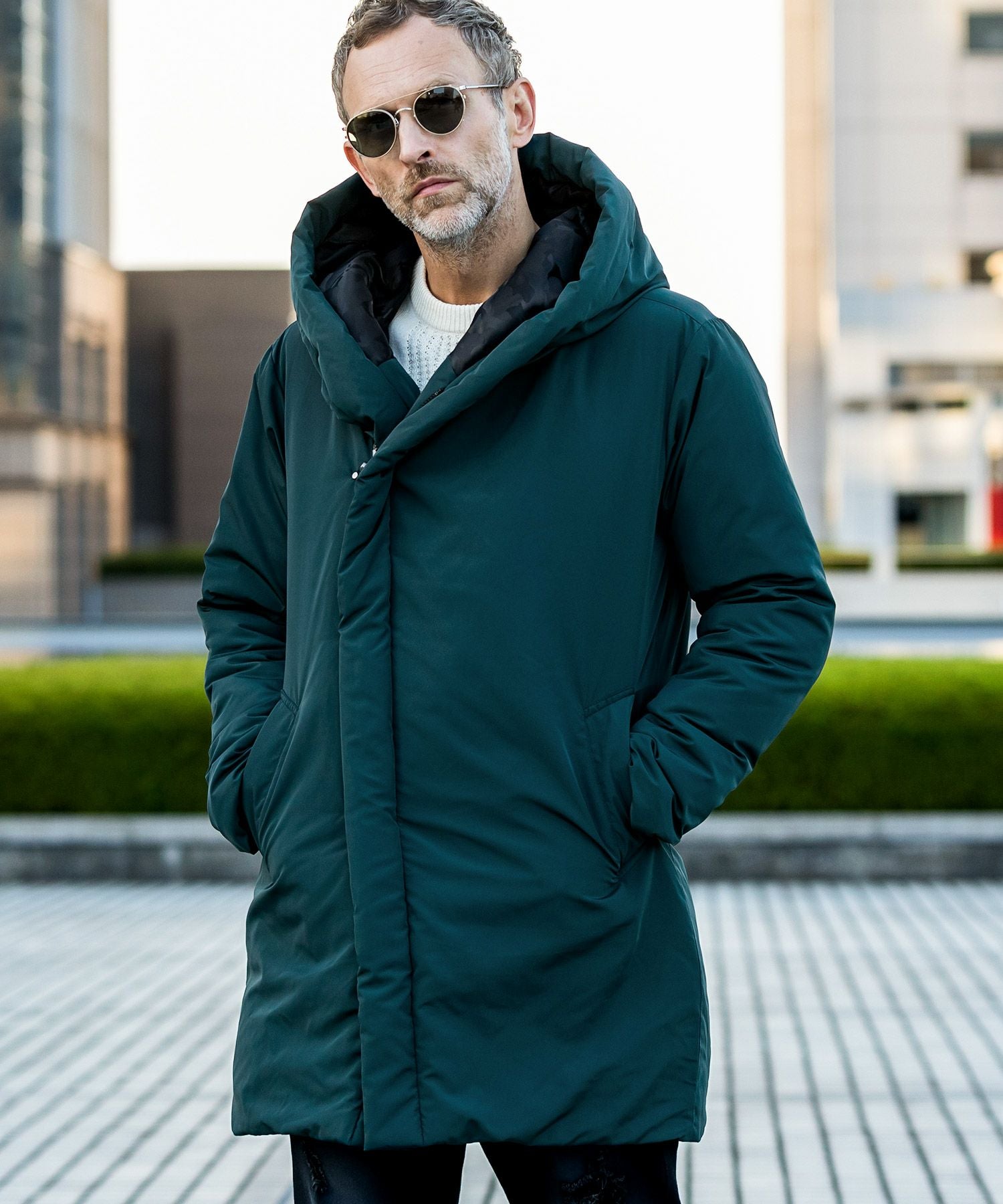 AKM Contemporary(エイケイエムコンテンポラリー)ダウンラップコート