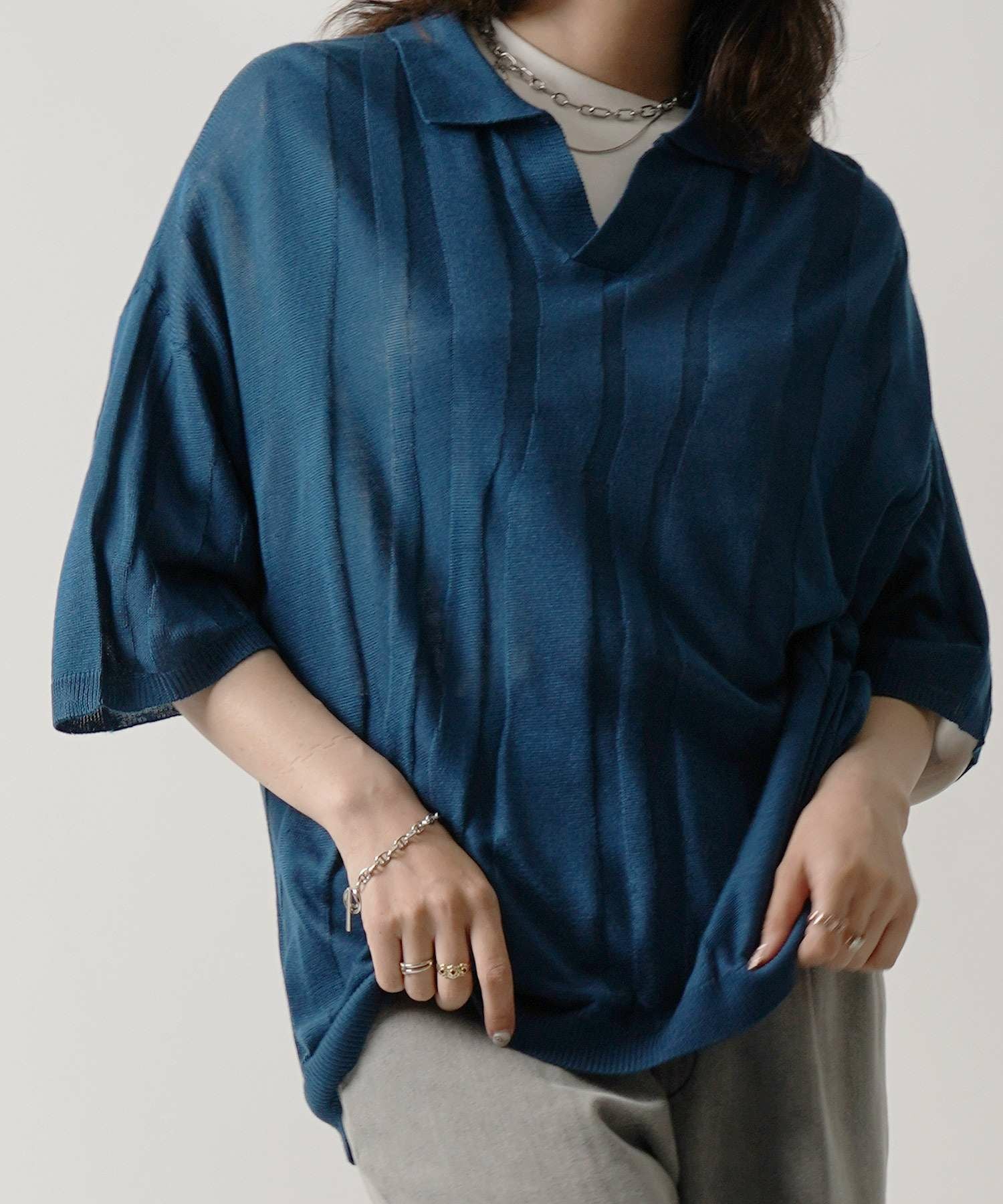 Confirm（コンファーム）エンボス スキッパー ニットポロシャツ メンズ