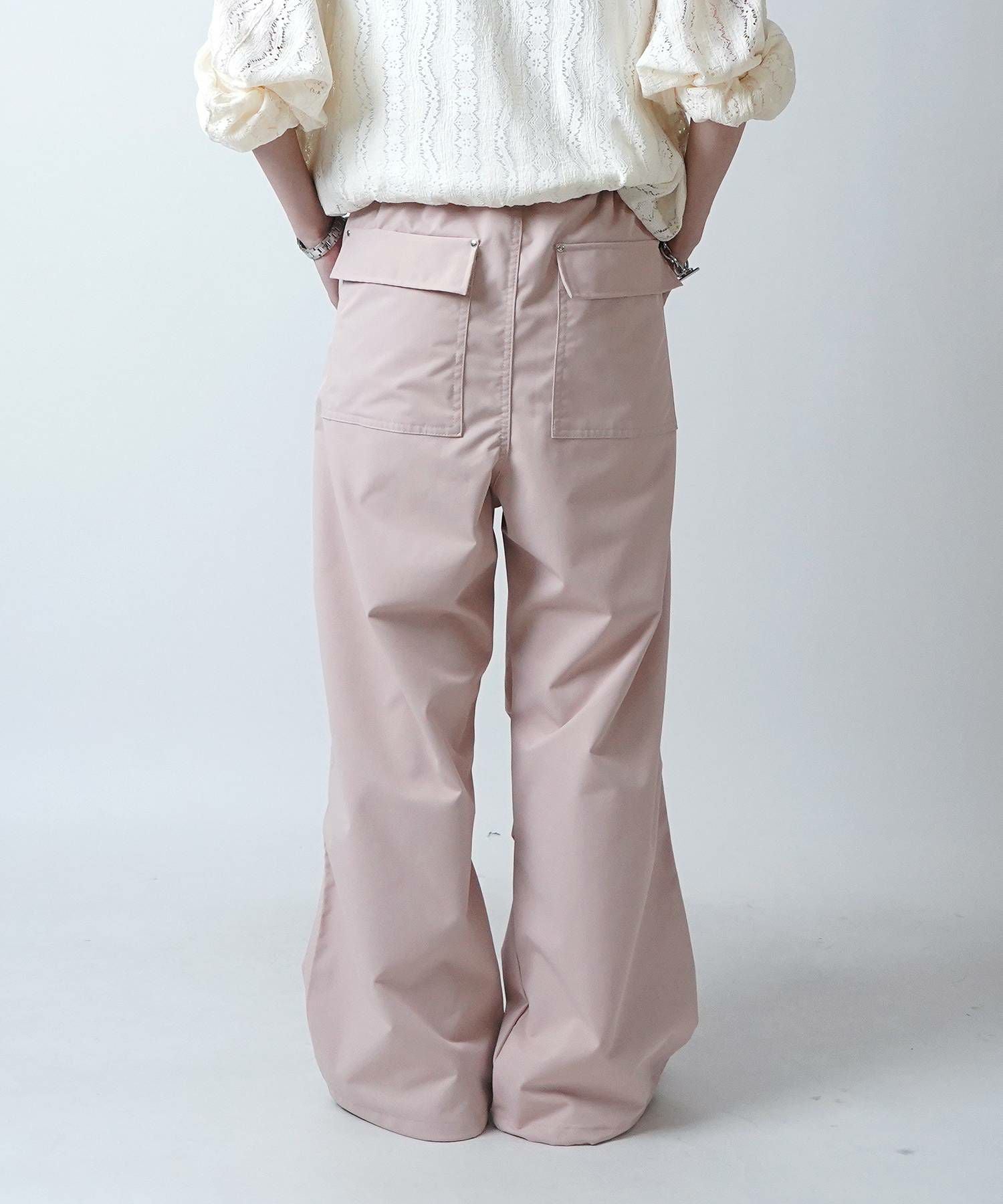 Confirm（コンファーム）リベット付 デザインパラシュートパンツ 裾