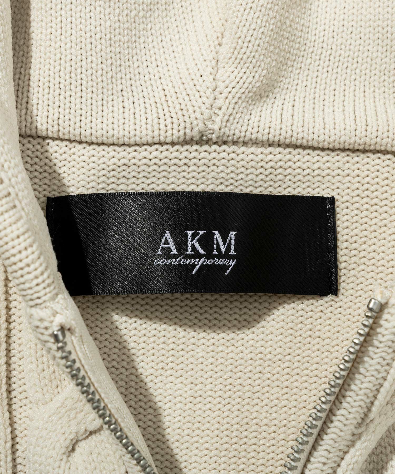 AKM Contemporary(エイケイエムコンテンポラリー)サイドケーブルニット